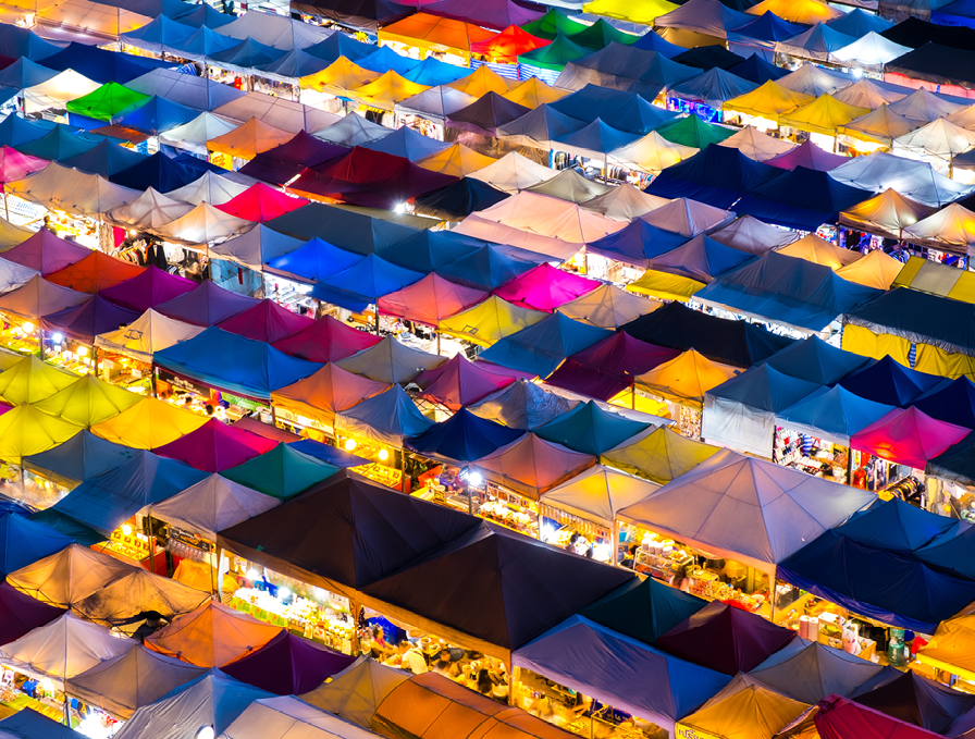 Retail - market tents in many colors by night